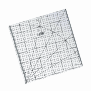 Regla Acrílica Transparente de 30 x 30 cm.